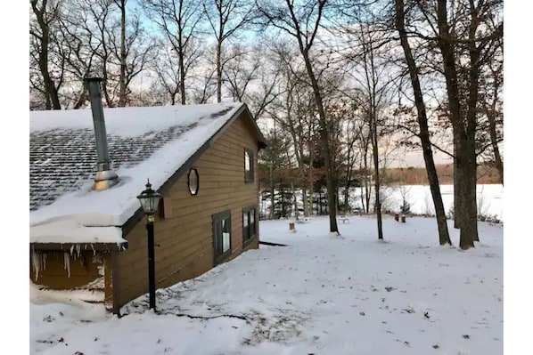 Winter view of cabin and Goose Lake