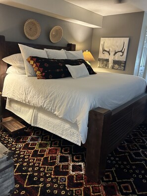 Master Bedroom with deck for viewing surrounding vistas, 2 walk-in Closets