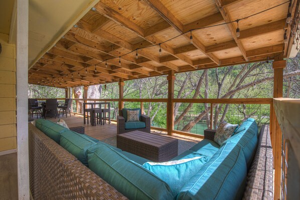 Huge covered patio overlooking the river 