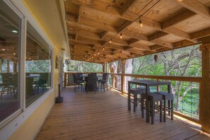 Covered patio overlooking Guadalupe River 