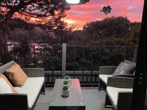 View stunning sunsets from the balcony. Especially in the fall and winter! 