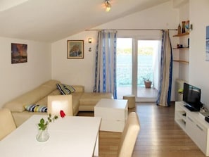 Dining area and living room with sea view