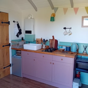 Kitchen includes small fridge,toaster,microwave & most things you could need