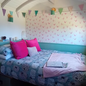 Comfy double bed. Can be folded up if preferred in the day.