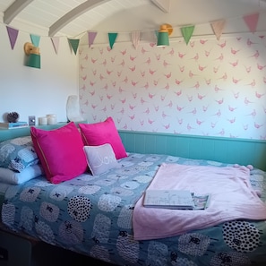 Comfy double bed. Can be folded up if preferred in the day.