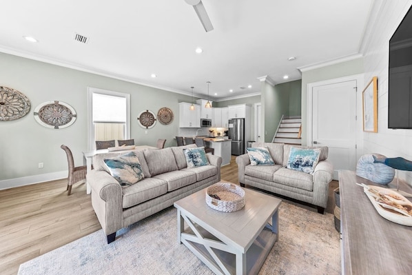 Inviting living room with 10 foot ceilings provides a great place to hang out
