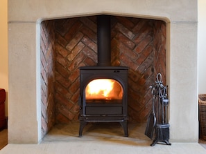 Cosy living room with wood burner | Far Barsey Cottage, Barkisland, near Halifax