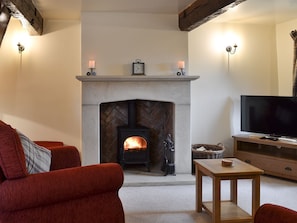 Cosy living room with wood burner | Far Barsey Cottage, Barkisland, near Halifax