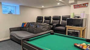Bonus Room: Game Room & Home Theater! Enjoy a game room with a pool table, darts, basketball arcade game, and foosball table. Relax in the home theater with a queen pullout couch and 4 leather stadium seats with massage features. Additional fee applies.