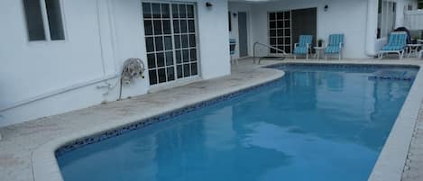 New diamond Brite heated pool and patio area.2 patio tables,12 chairs.8 chaises