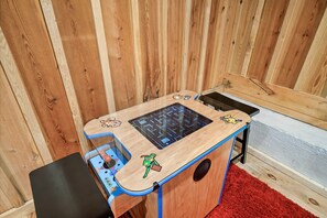 The Game Room is a Gamer's Paradise with a Multicade System featuring 60 Games