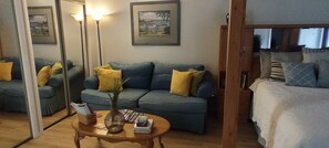 Livingroom couch and coffee table with tons of information for you!