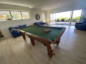 Full size billiard table in the living area