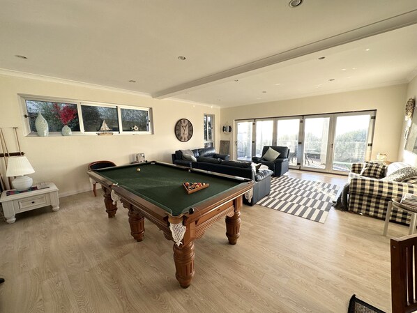 Living room with full size billiard table