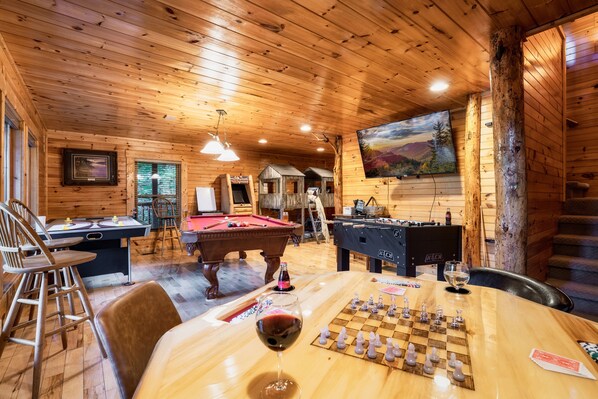 Game Room With 65 Inch TV For Steaming