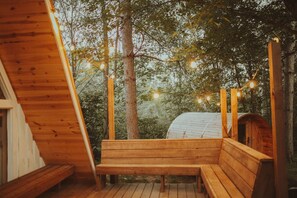 Front Deck with String Lights and Bench Seating