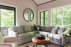 Main living room area in an open floor plan main floor.