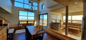 Open plan dining room, living room and kitchen.