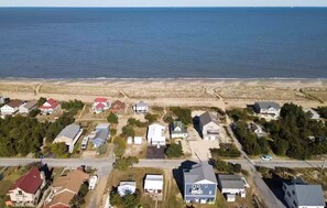 Aerial view of our home and the nearby bay 