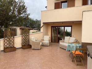 Outside patio area with furniture 