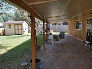 Huge, shaded, back deck for entertaining so you can enjoy the summer outdoors.