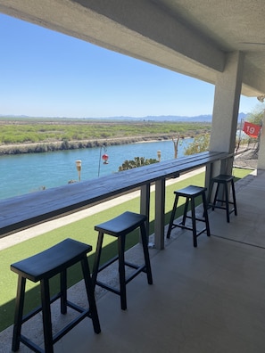 Outside bar eating area with putting green