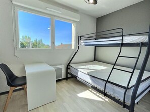 Get a peaceful night sleep in our cozy bedroom. Bedding configurations vary!