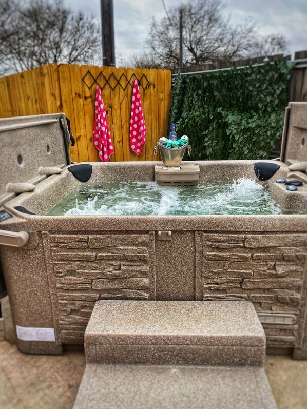 Dip and sip; the hot tub is drained and sanitized after EVERY guest stay. 
