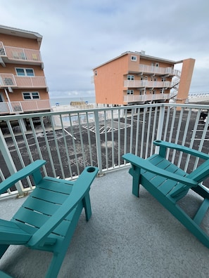 Relax from the balcony with views of the beach and ocean