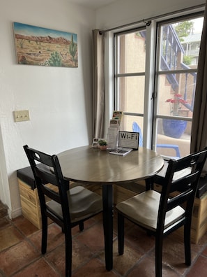 Cute dining table perfect for sharing a meal or doing work.
