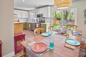 Dining area for 6 with plenty of Kitchen Utensils for Fixing your Favorite Home-Made Meals
