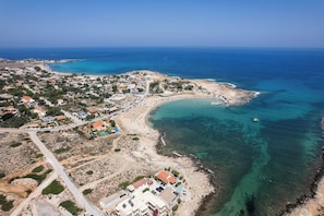 A serene retreat close to sandy bays with crystal-clear waters.