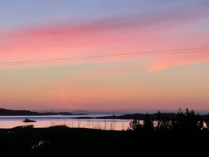 Enjoy sunsets like this one above Aultbea 
Rocky and Sandy beaches close by