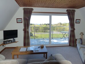 Living room with 2 x Large 2 Seater Sofa's. Patio Door leads on to balcony