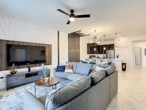 Relax on the comfy couch and enjoy the TV after a day exploring the city