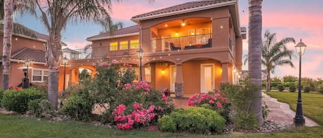 Sunset view of the backyard and patio.