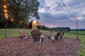 Roast some marshmallows over the outdoor fire pit located in between the 2 cabins.