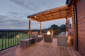 This covered fire pit area is magical in the evenings!