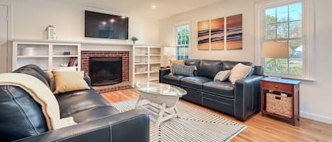 Living room with Smart TV and fireplace