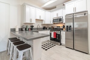 Fully equipped kitchen - open concept to the living area 