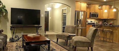 Great Room View of Foyer, Office Bdrm, Kitchen & Island, 65" Streaming Roku TV 