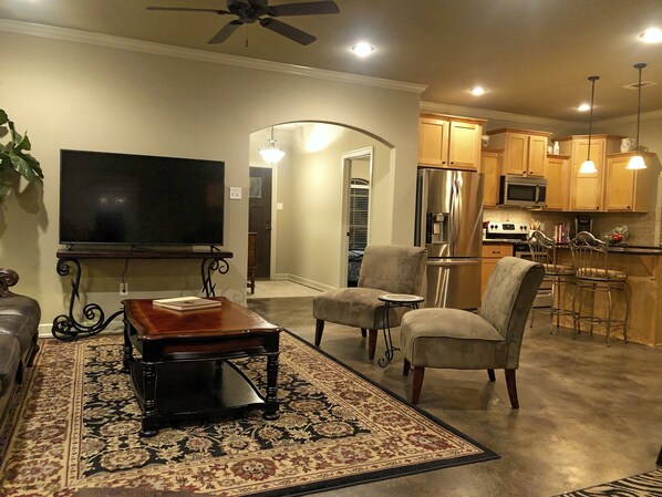 Great Room View of Foyer, Office Bdrm, Kitchen & Island, 65" Streaming Roku TV 