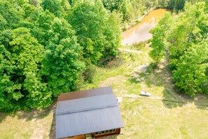 Check out the pond behind the cabin!