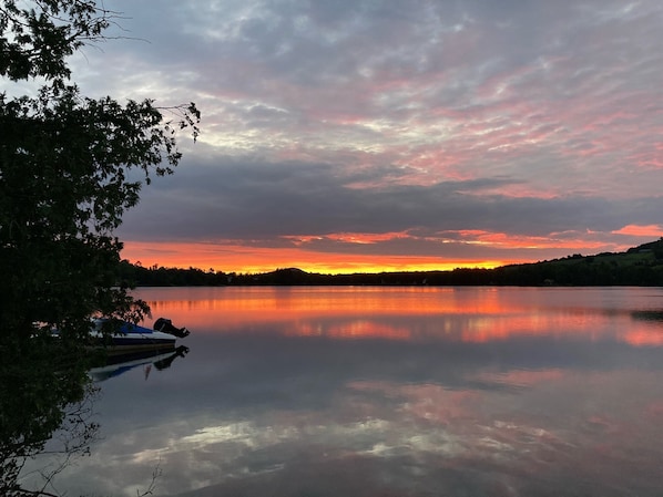 Sunrise from dock. Bring your coffee to the lake. Listen to the fish jumping.