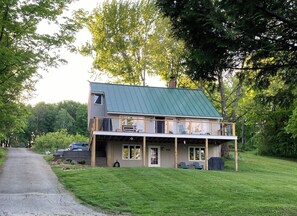 Main house. Apartment entrance under deck.