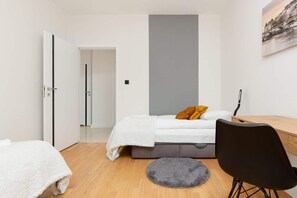 The bedrooms' elegant decor creates a serene and restful environment.