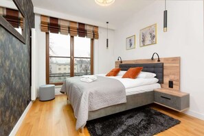 The cosy bedroom features a luxurious double bed.