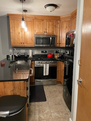 Fully loaded kitchen with new appliances plus In unit laundry.