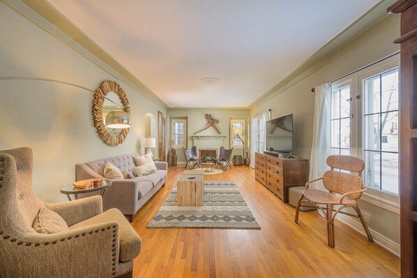 Spacious living room with lots of natural light.