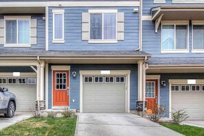 One of two entrances to the town home. You have complete access to the garage throughout your stay as well as the paved parking pad and street parking off the main entrance. 